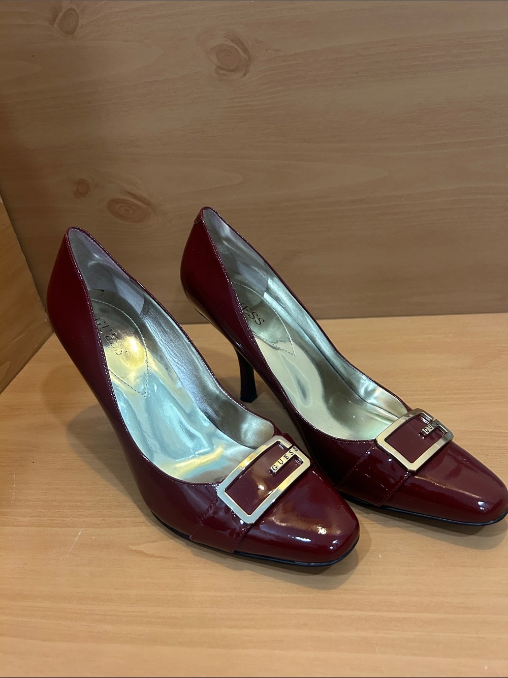 GUESS Burgundy Patent Pointed-Toe Pumps with Gold Buckle